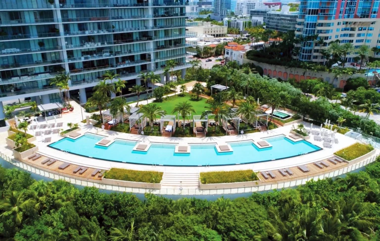 PtrBlt Miami Apogee pool deck in a crescent shape around an arched pool